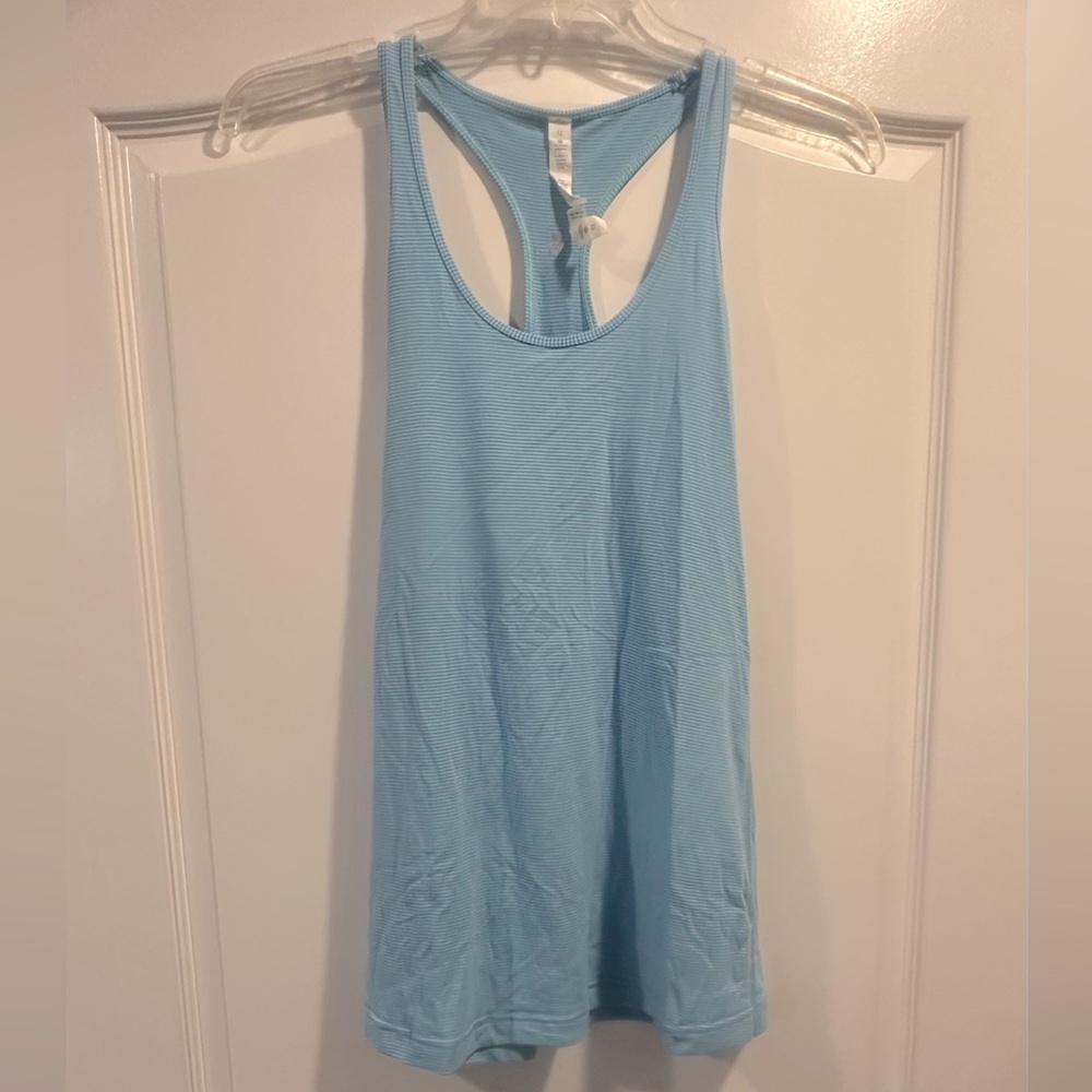 Light blue and purple striped Lululemon size 12 racer back tank top.